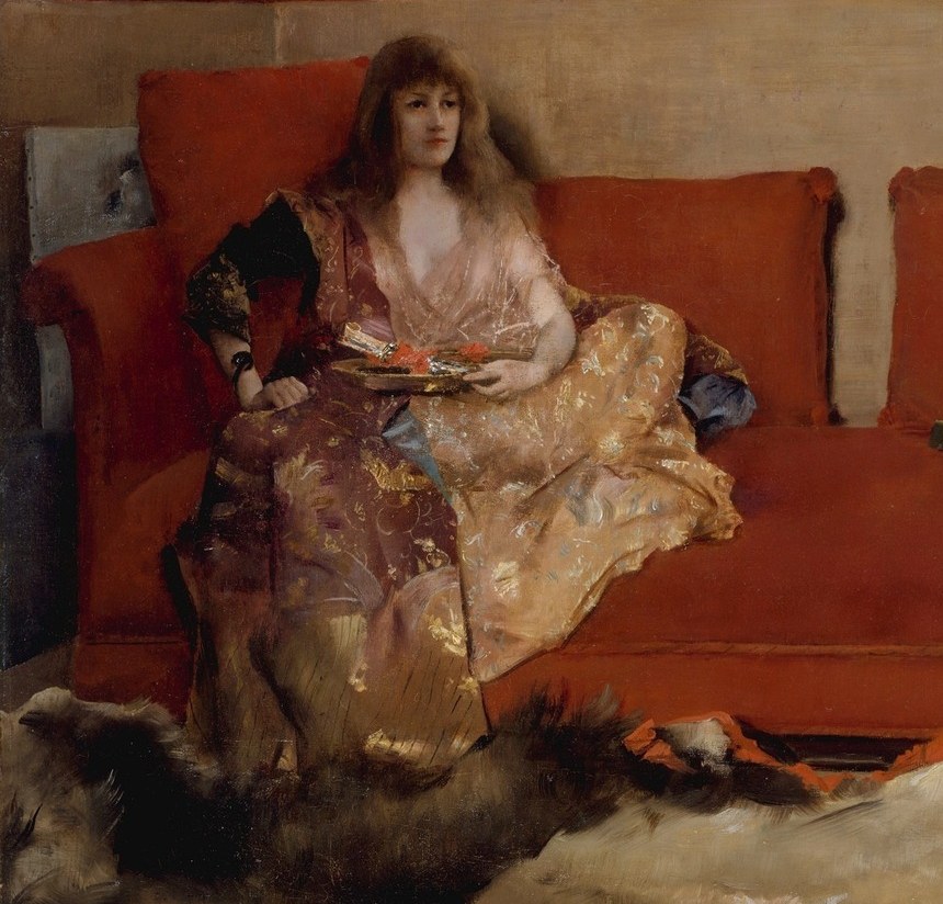The red sofa does a different kind of work. It pushes the pink dress forward.