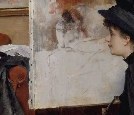 A woman in black, locked onto a canvas we cannot see.