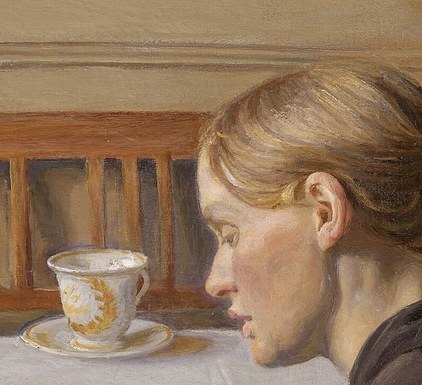 Her gaze is directed downwards, suggesting deep concentration on the child, conveying a sense of gentle care.