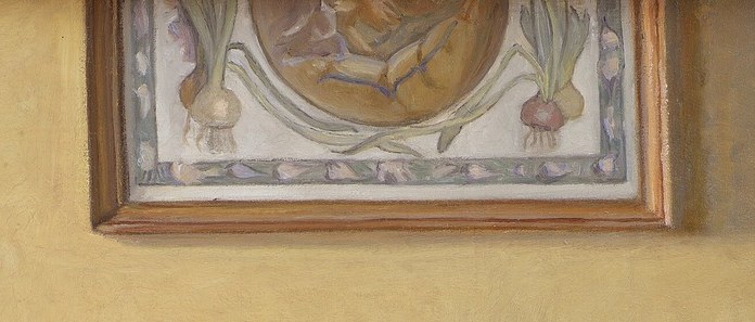 Notice the small painting hanging on the wall.