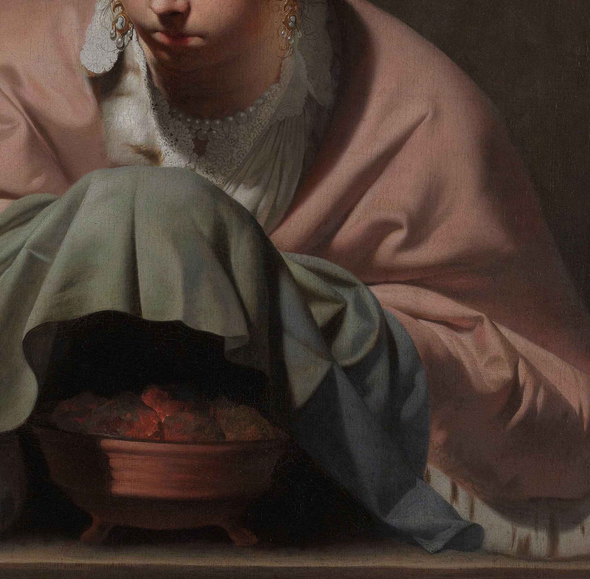 The soft folds and color of the robe suggest comfort and perhaps a touch of luxury, a visual respite from the harshness of winter.