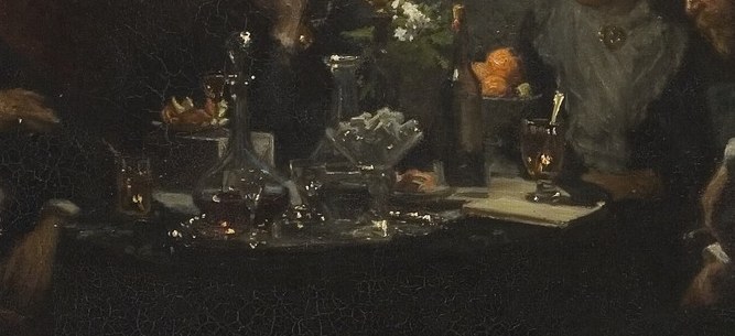An intimate scene unfolds around the table.
