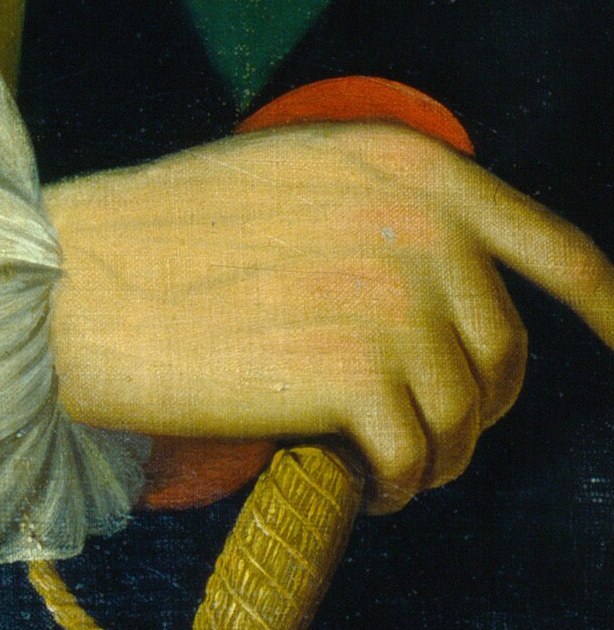 Look at his hand, firm on the sword hilt.