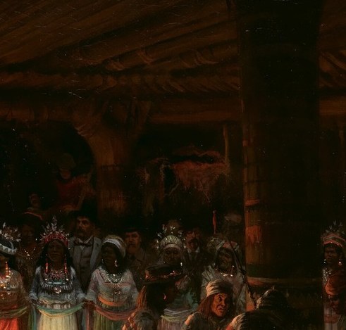 The headdresses mark this as a ritual gathering, not a performance.