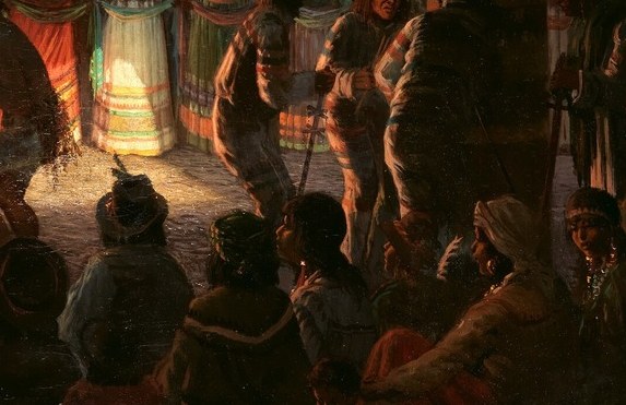 A fire at the center below warms the dancers from beneath.