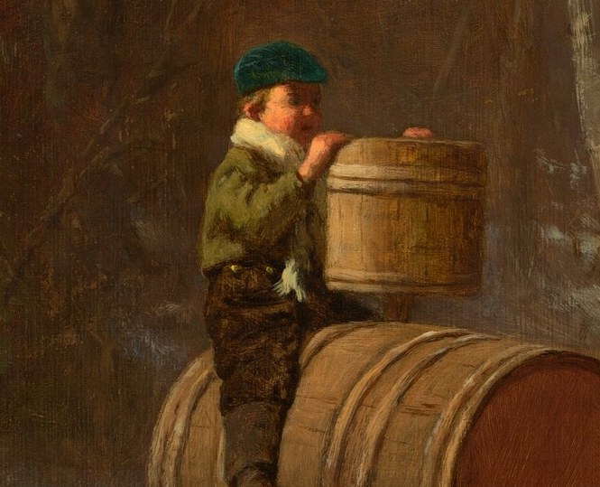 But look closely at the boy, perched atop the barrel.