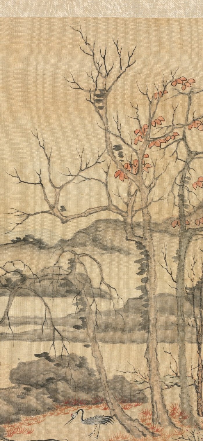 The bare branches and red leaves mark the changing season.
