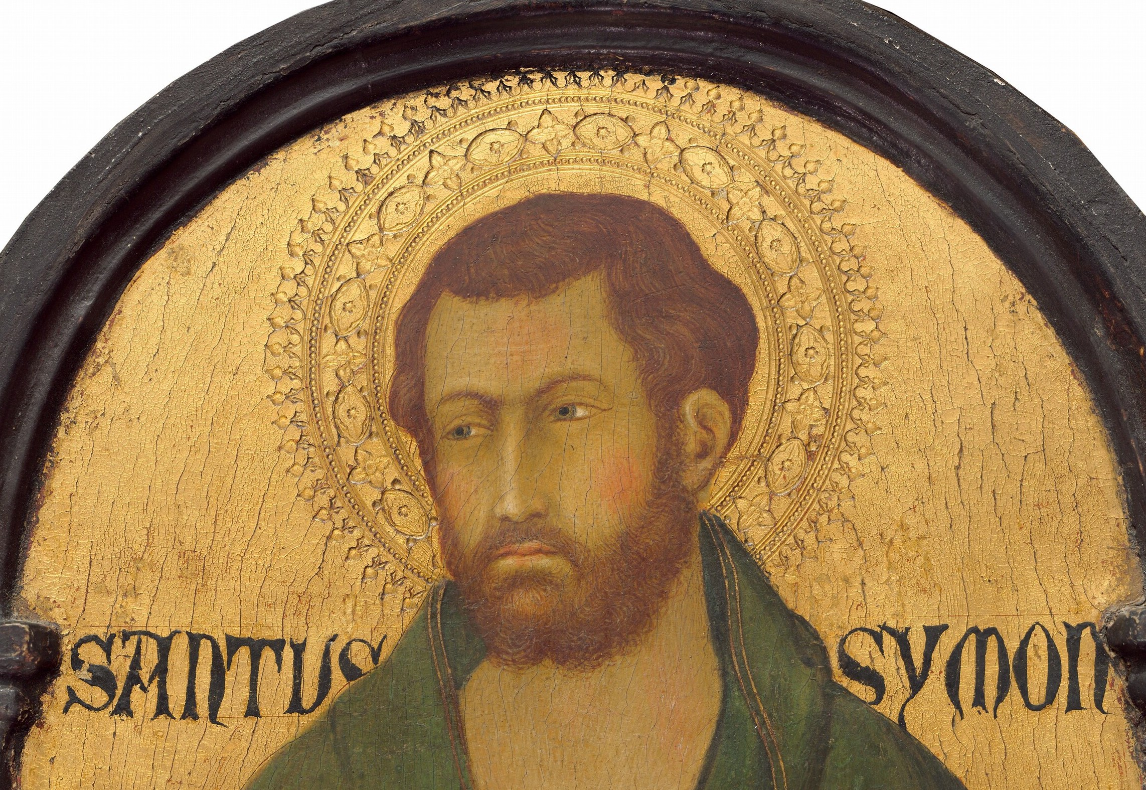 Notice the detailed gold leaf background, characteristic of the era.