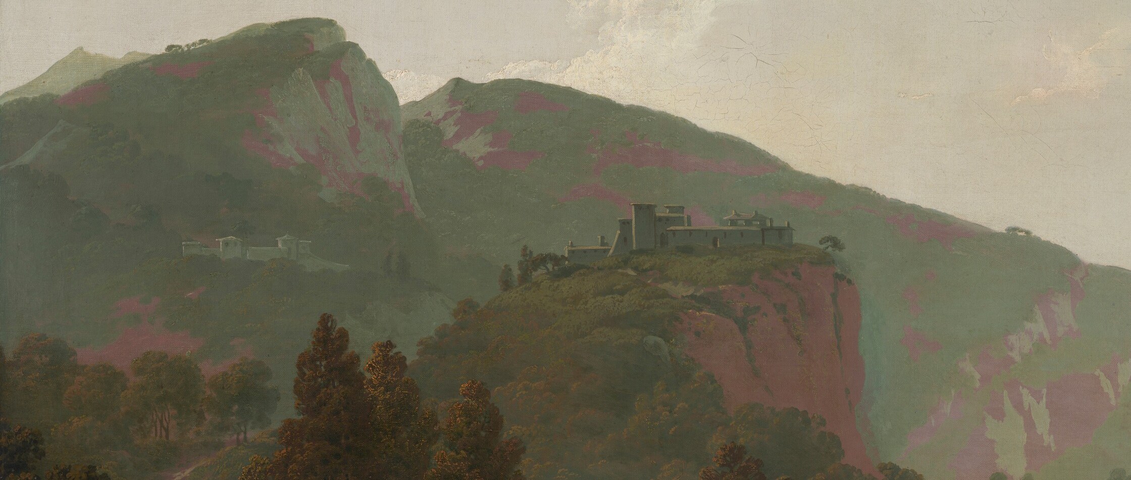 Look closely at the cliffs, painted with unusual pinkish hues.