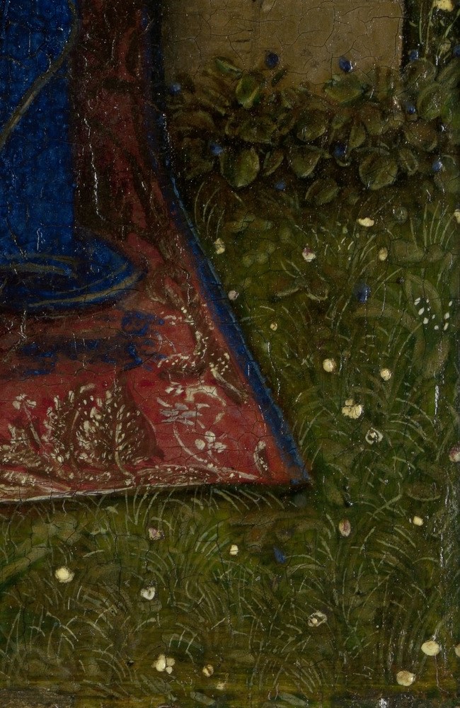 The lush garden grass and flowers represent Eden, a new paradise.