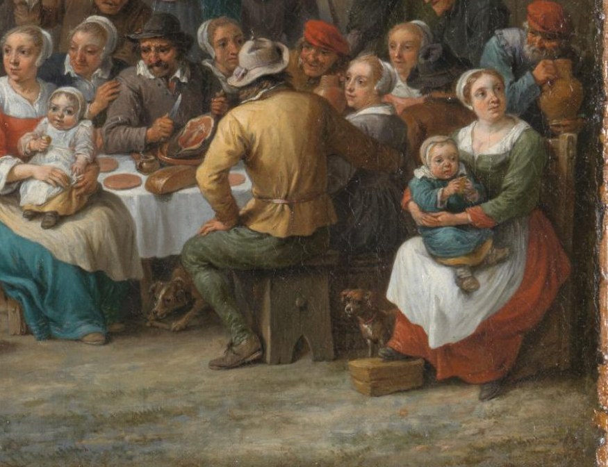 Amidst the revelry, a quiet family moment unfolds.