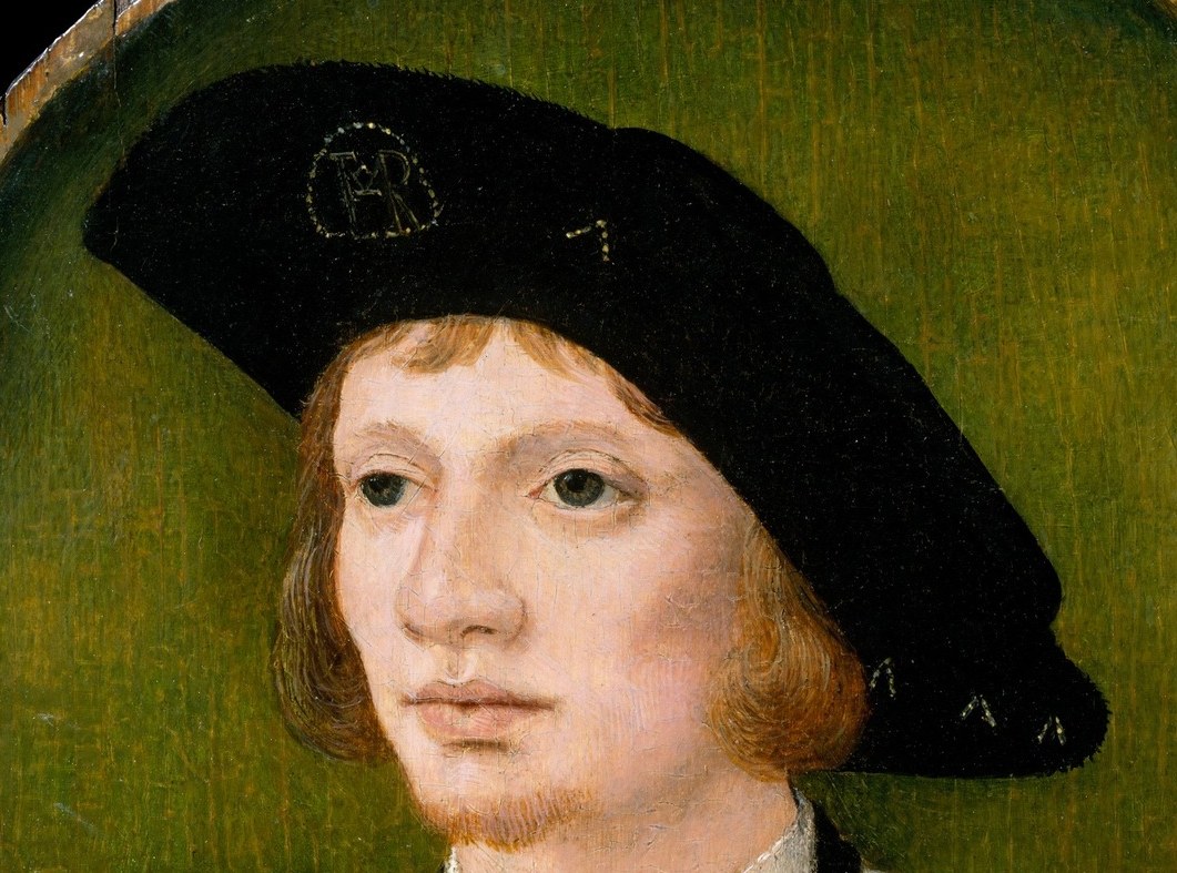 But look closely at his black hat.