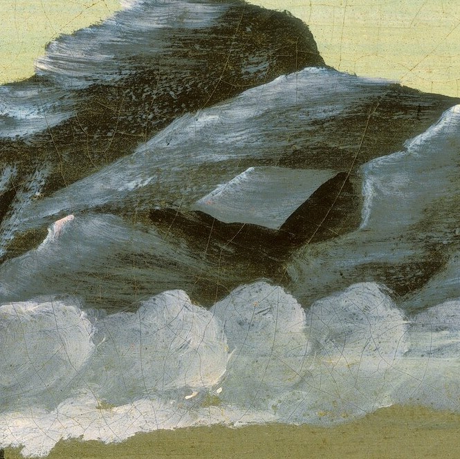 Its steam rises to meet the towering rock face.