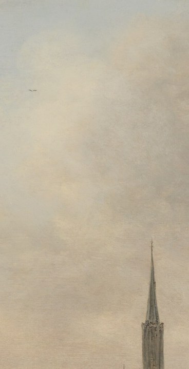 A second, thinner church spire creates a counterpoint to the broad towers , the pairing tells you this was a prosperous town with multiple major parishes