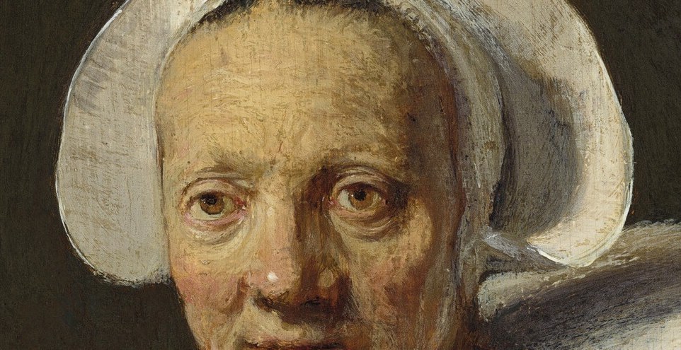 Her modest white cap was a common style then.
