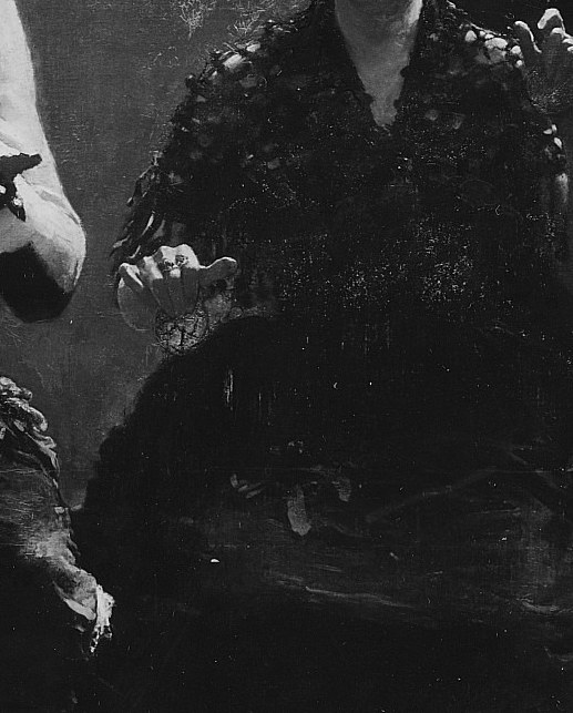 Her composed posture and folded hands create a sense of quiet contemplation or perhaps restrained emotion amidst the scene.