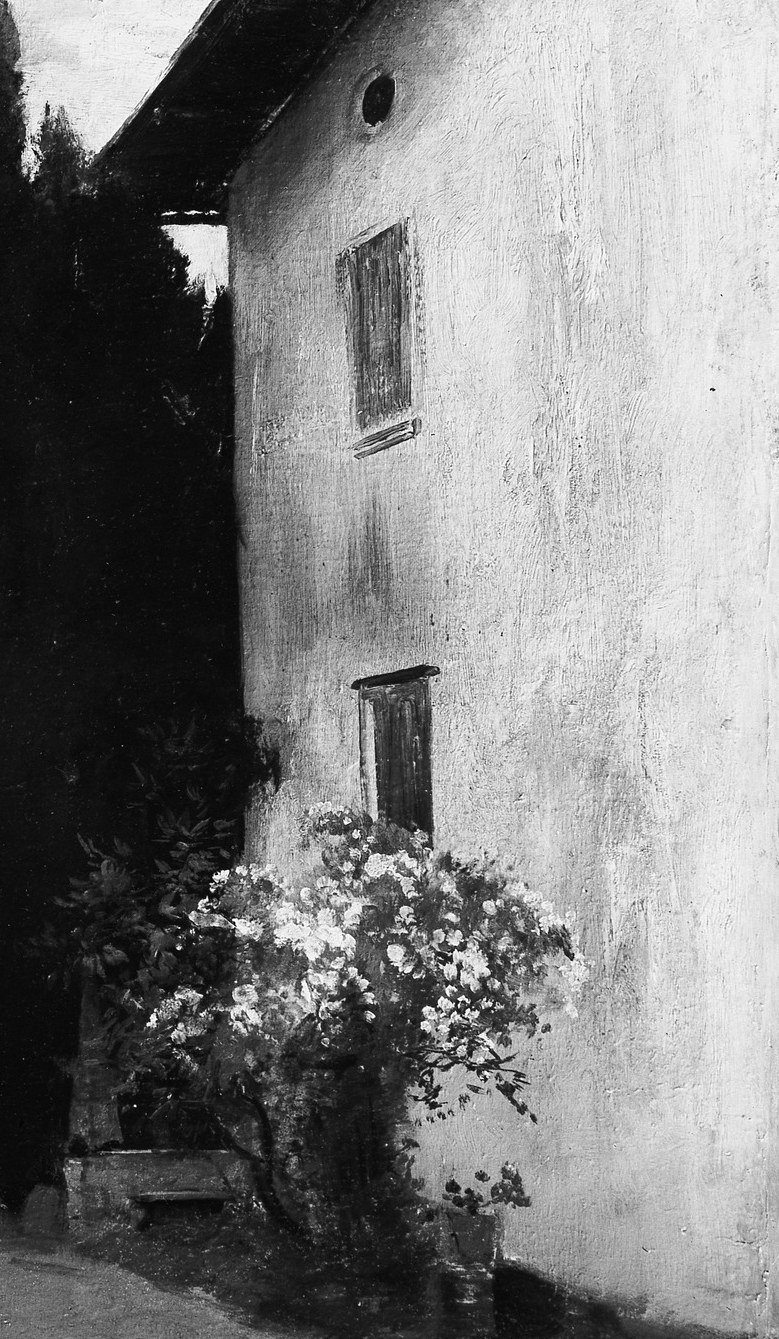 Look closely at the wall of the building.