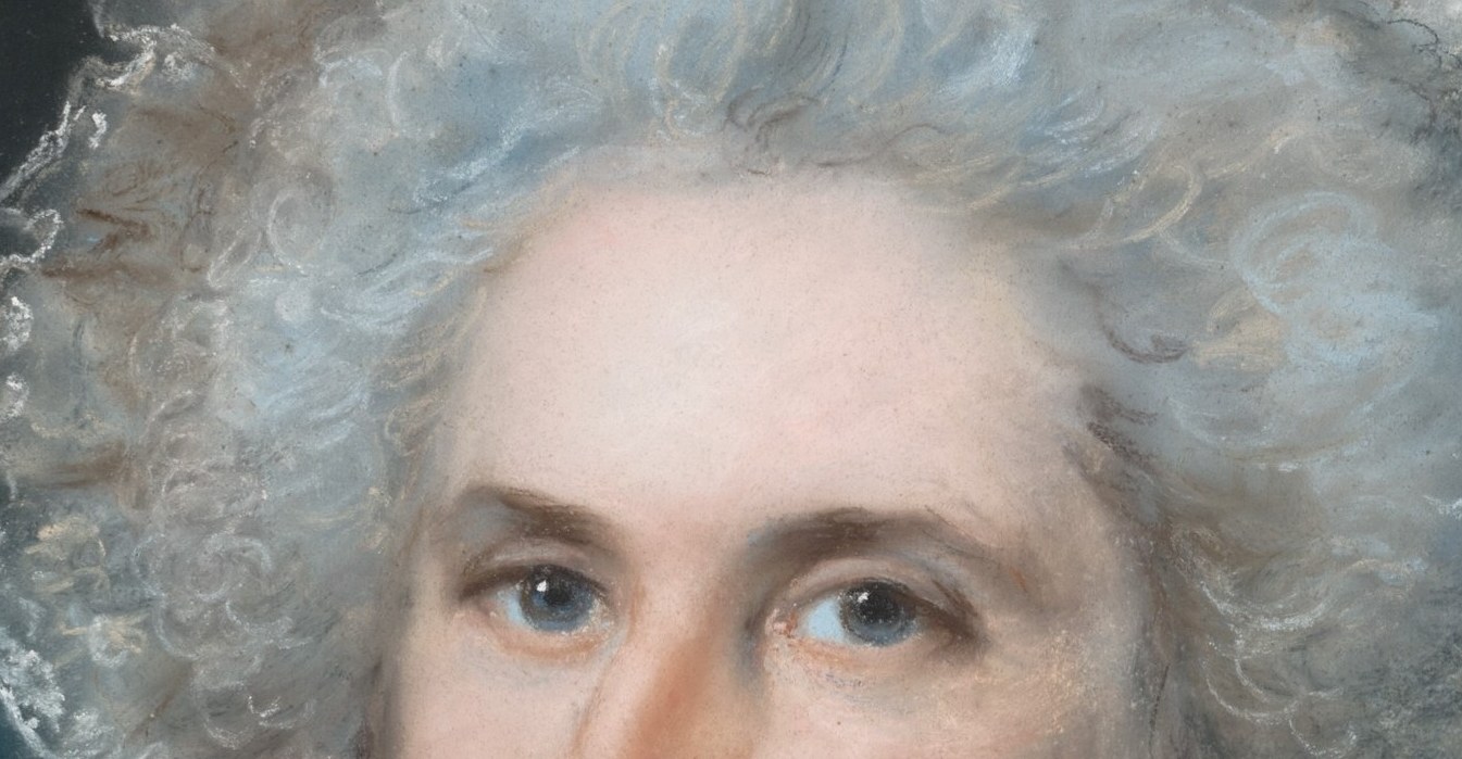 Russell positions her gaze squarely at the viewer, a choice that feels intimate and self-possessed for a formal anniversary commission.