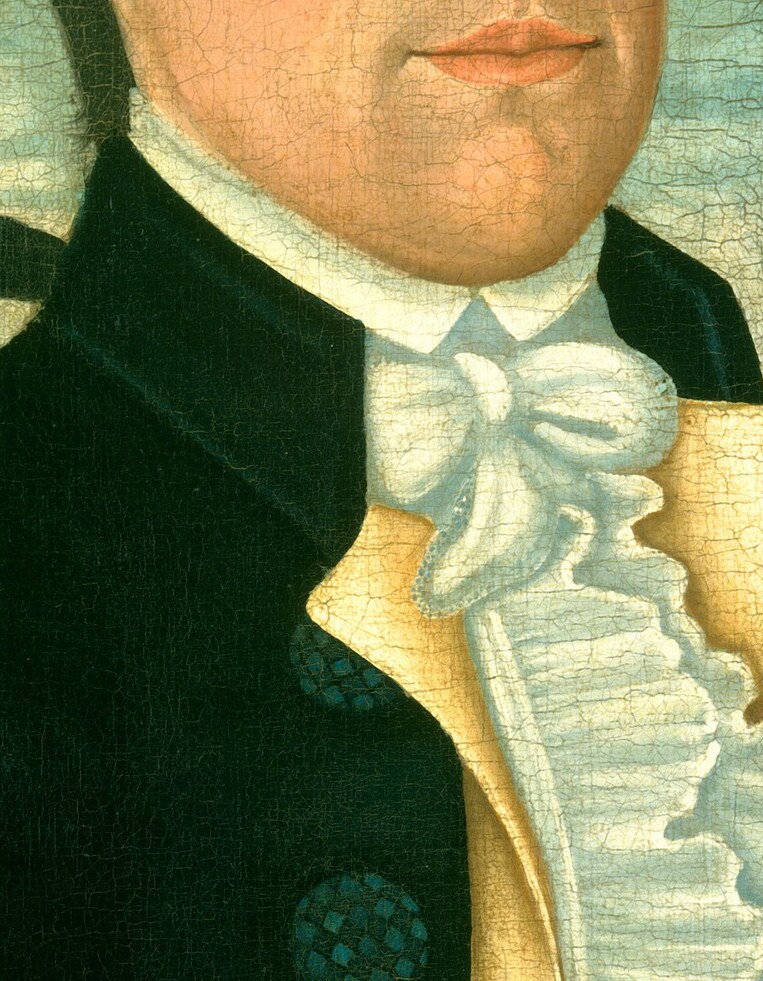 His ruffled neckwear signifies his wealth and social standing.