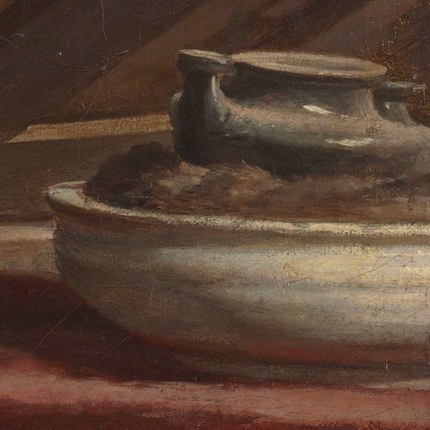 These objects suggest that her reading might be interrupted by, or related to, writing or scholarly work.