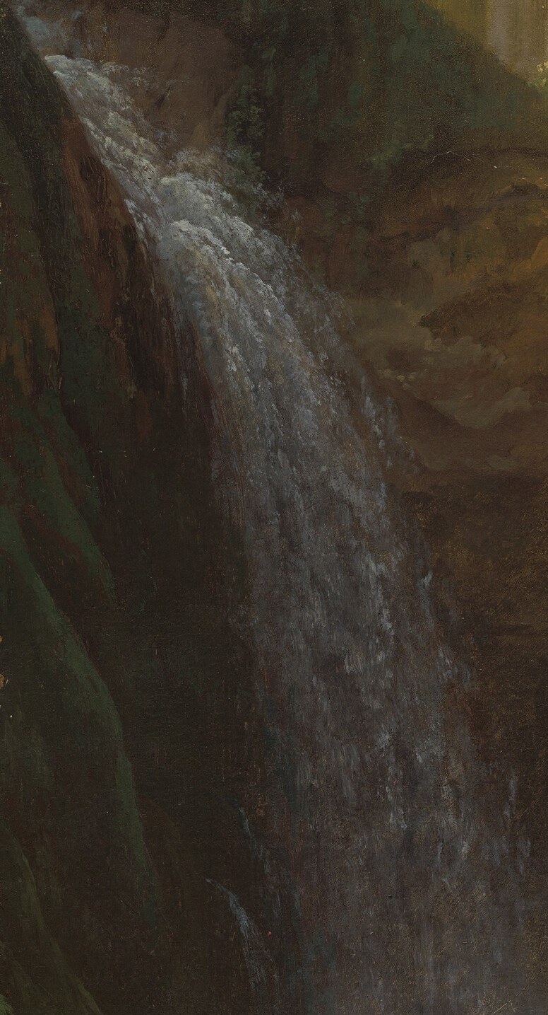 Shows the raw power of nature, with water plunging into the unseen depths below.