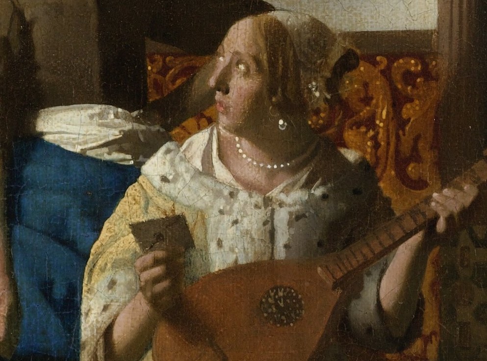 Her expression is one of gentle contemplation, hinting at the emotional weight of the letter she holds.