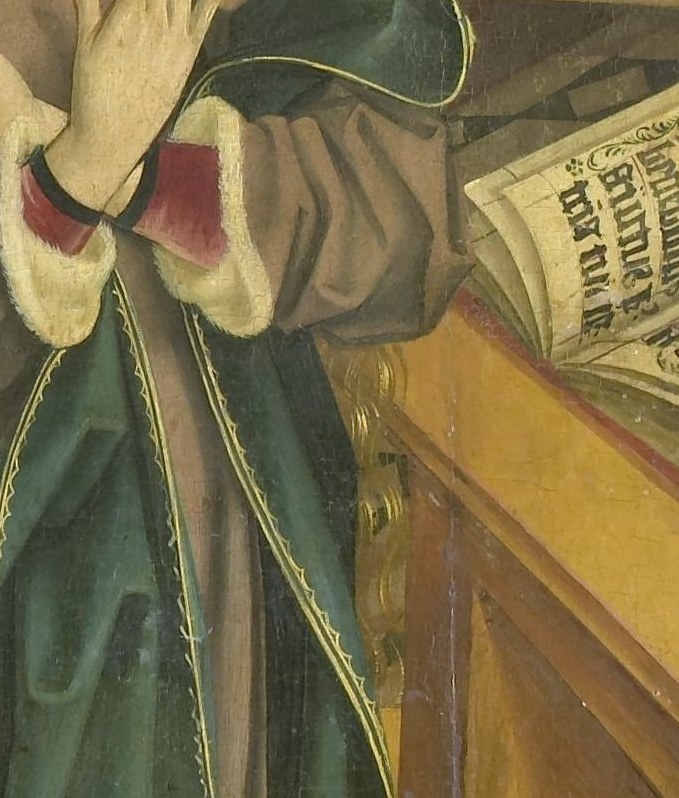This open book shows Mary's devotion to scripture.