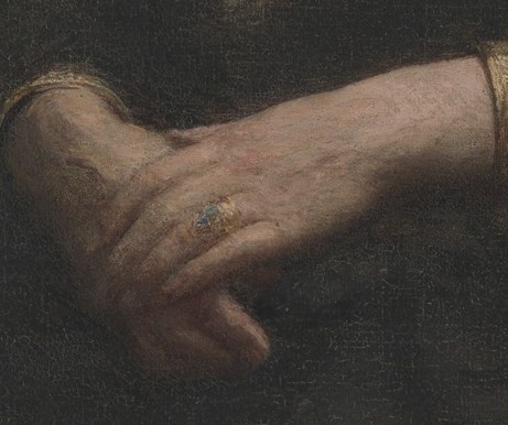 Her hands are clasped, a gesture of quiet stillness.