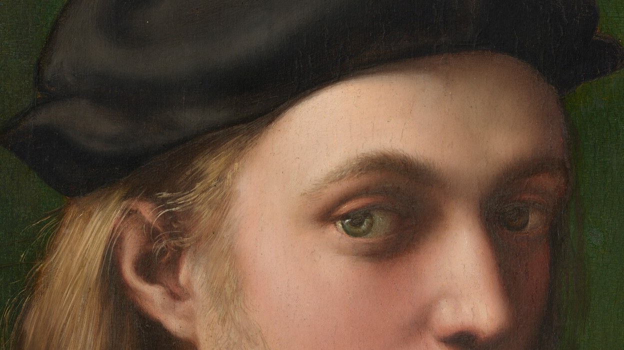 His body turns left, but his eyes lock you from the right.