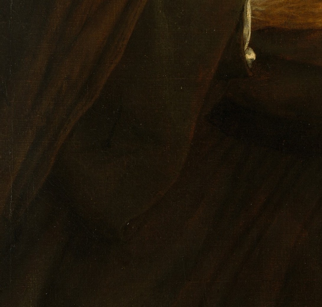 He holds a stone, the emblem of Saint Jerome in the wilderness.