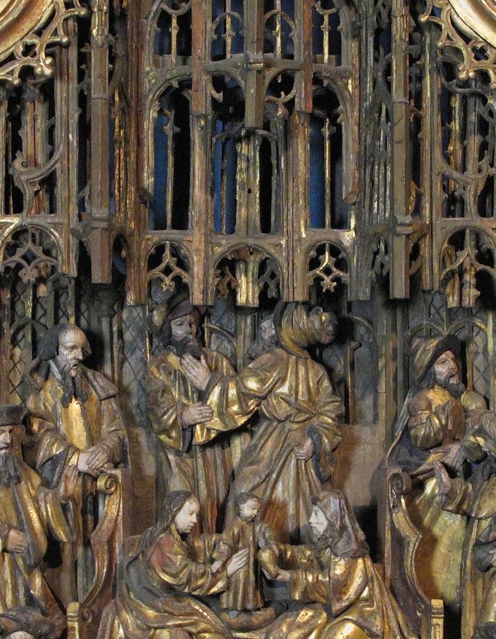 Saint Anne sits enthroned at the center of her holy lineage.