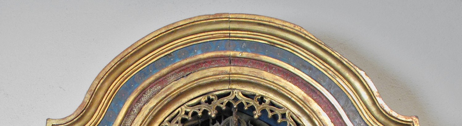 The polychrome painted frame contrasts with the gold interior , the blue, red, and gold palette situates this as a high-status late-Gothic devotional commission.