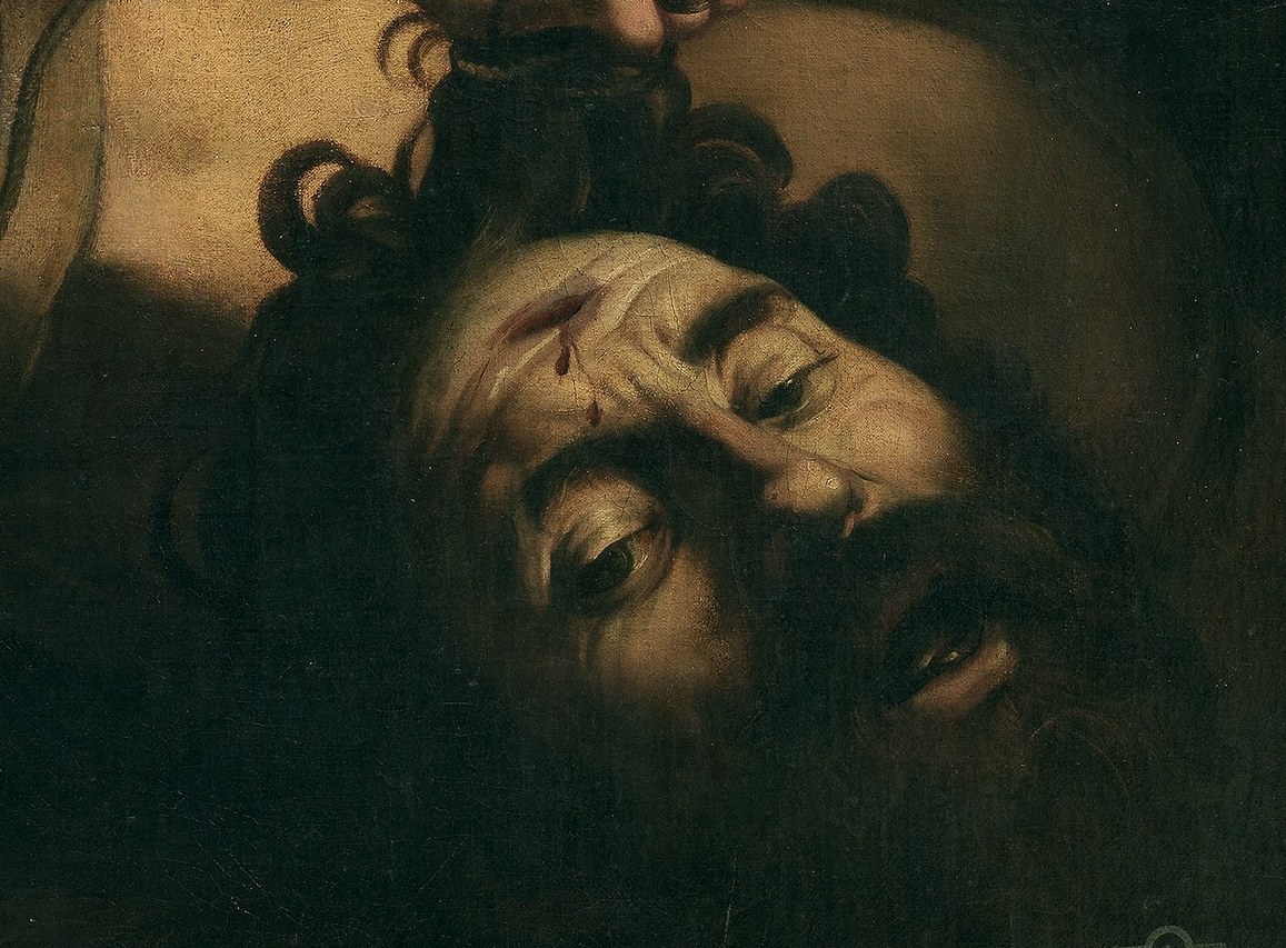 Goliath's expression shows utter suffering.