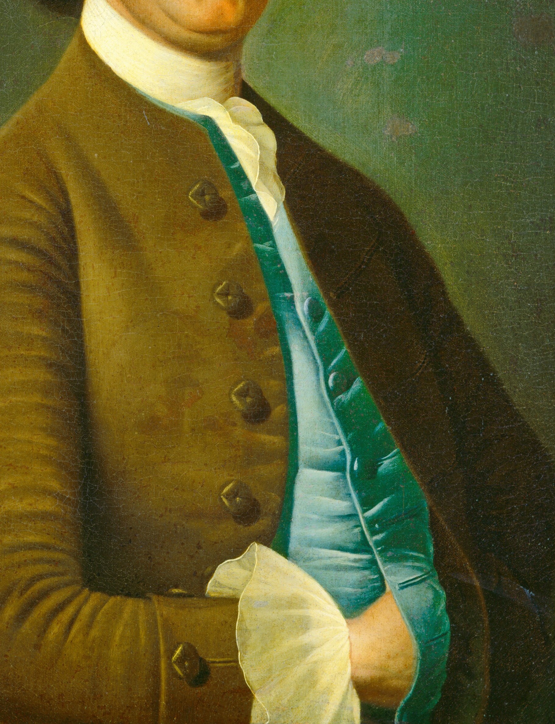 The texture and buttons suggest the sitter's status and the fashion of the era.