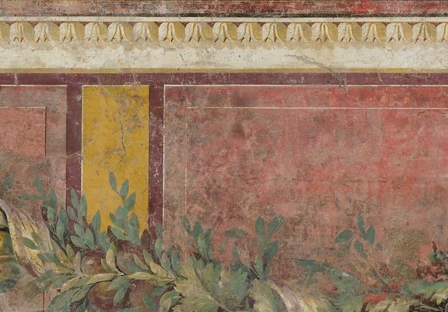 Grapes are the plant of Dionysus and the source of ritual wine; close framing of the individual painted spheres reveals the painter's technique for rendering light through a translucent skin in flat fresco.