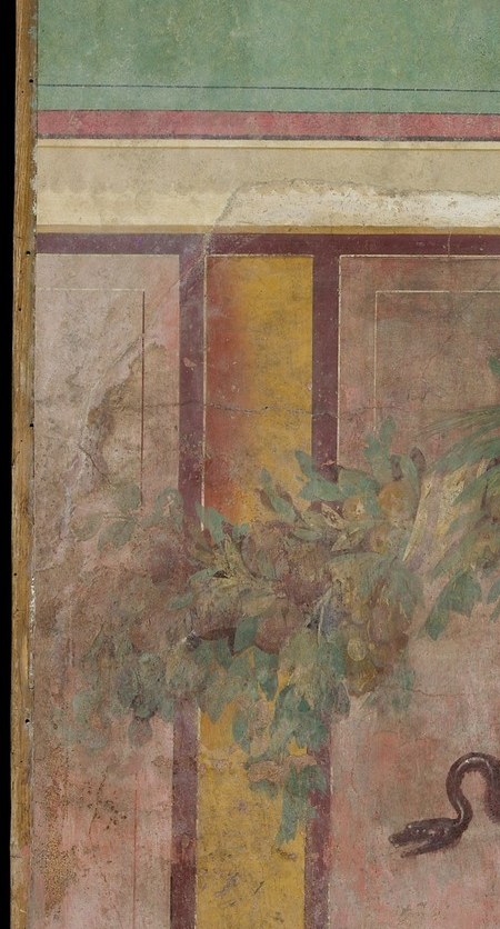 The flat fresco surface rendered as real marble masonry is the central deception of Second Pompeian Style; close framing reveals the brushwork that sustains the illusion of stone grain that does not physically exist.