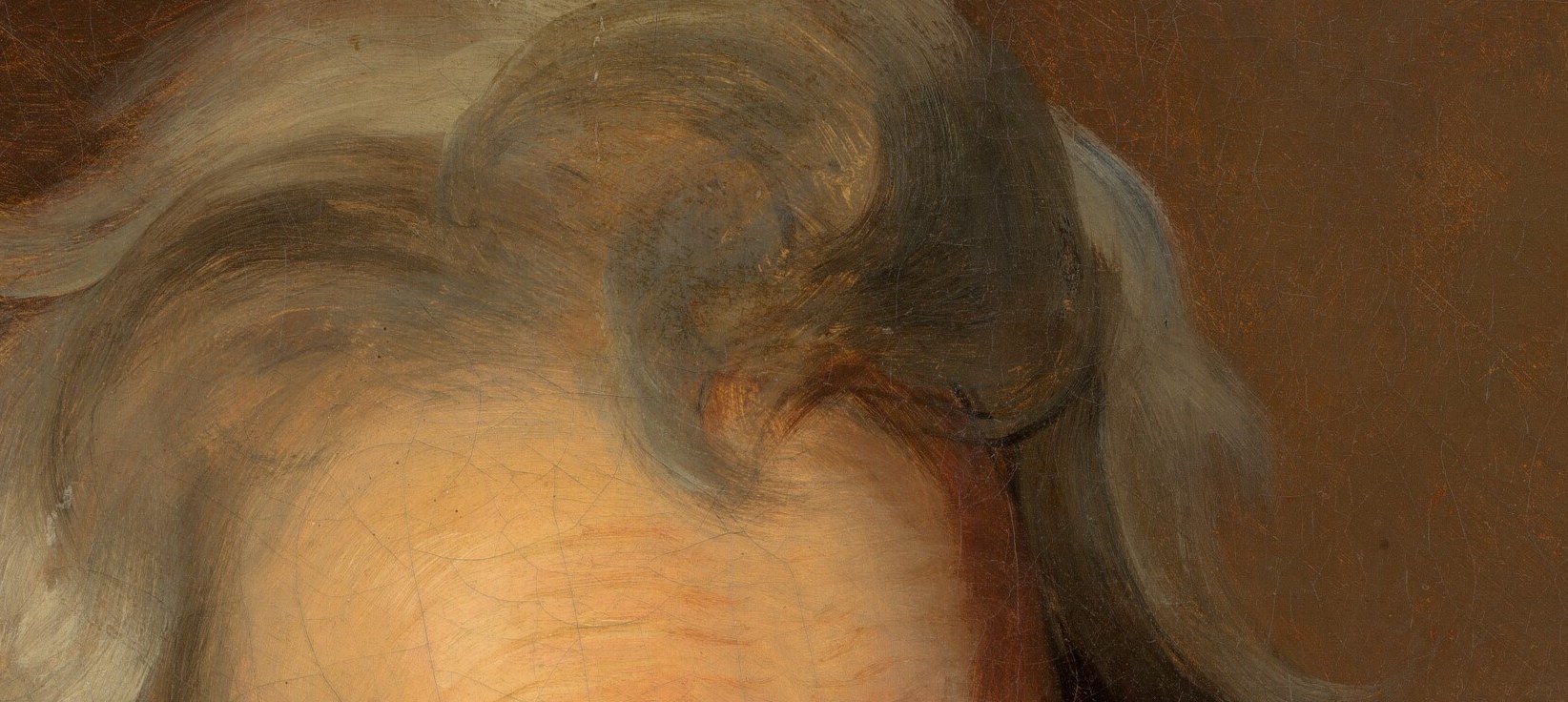 His brow is furrowed with the weight of his turbulent past.