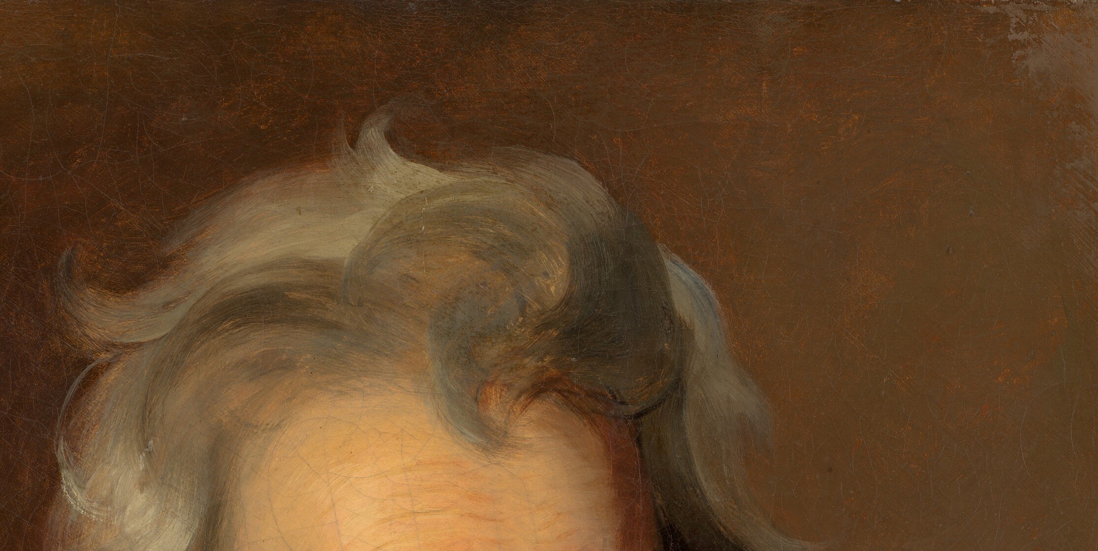 The dramatically upswept white mane is Jackson's most iconic physical feature , Sully uses it to frame and elevate the face.