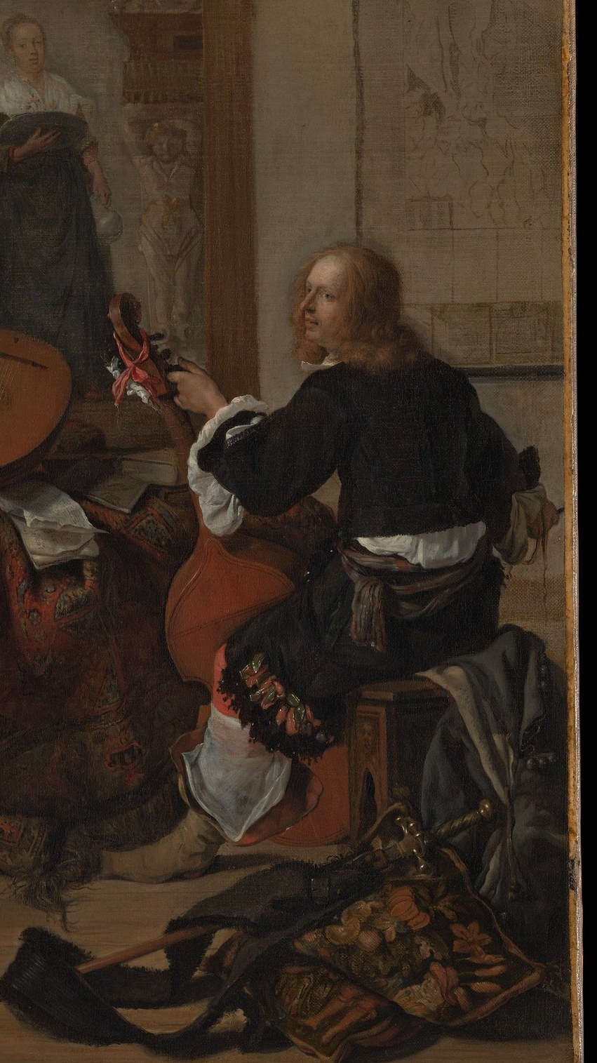 The nominal musician of the party; his dark clothing sets the tonal counterweight to the woman's bright gown.
