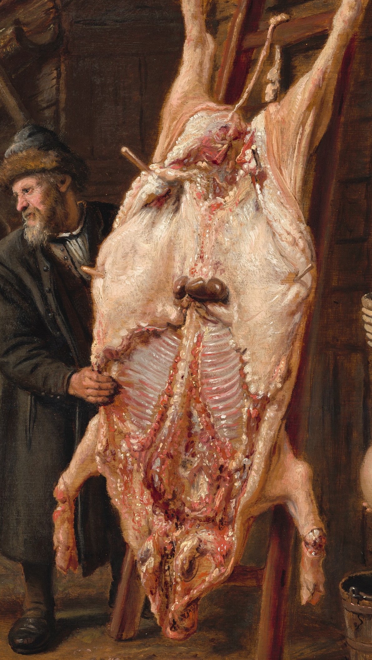The men prepare the hog, but look closely at the children.