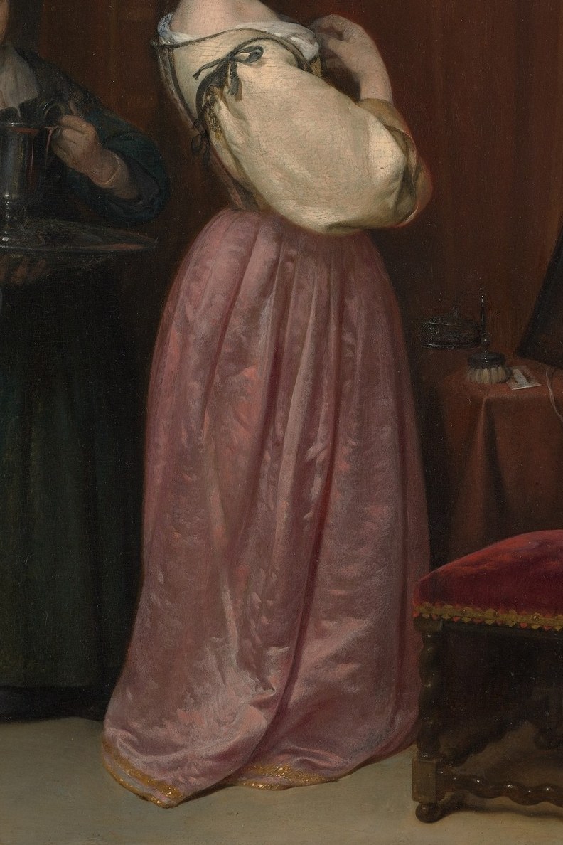 Look at the pink satin skirt.