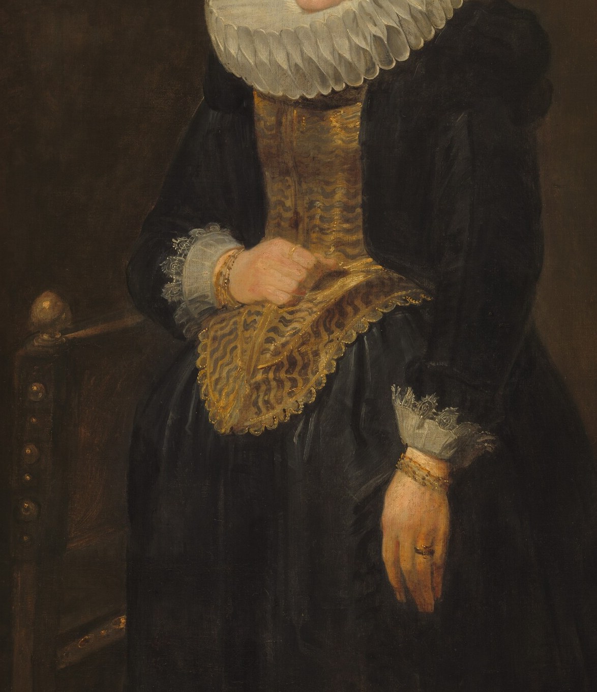Dense Spanish black, the costliest dye in early modern Europe, was the dominant color of Flemish patrician dress; Van Dyck renders subtle sheen and volume within the darkness.