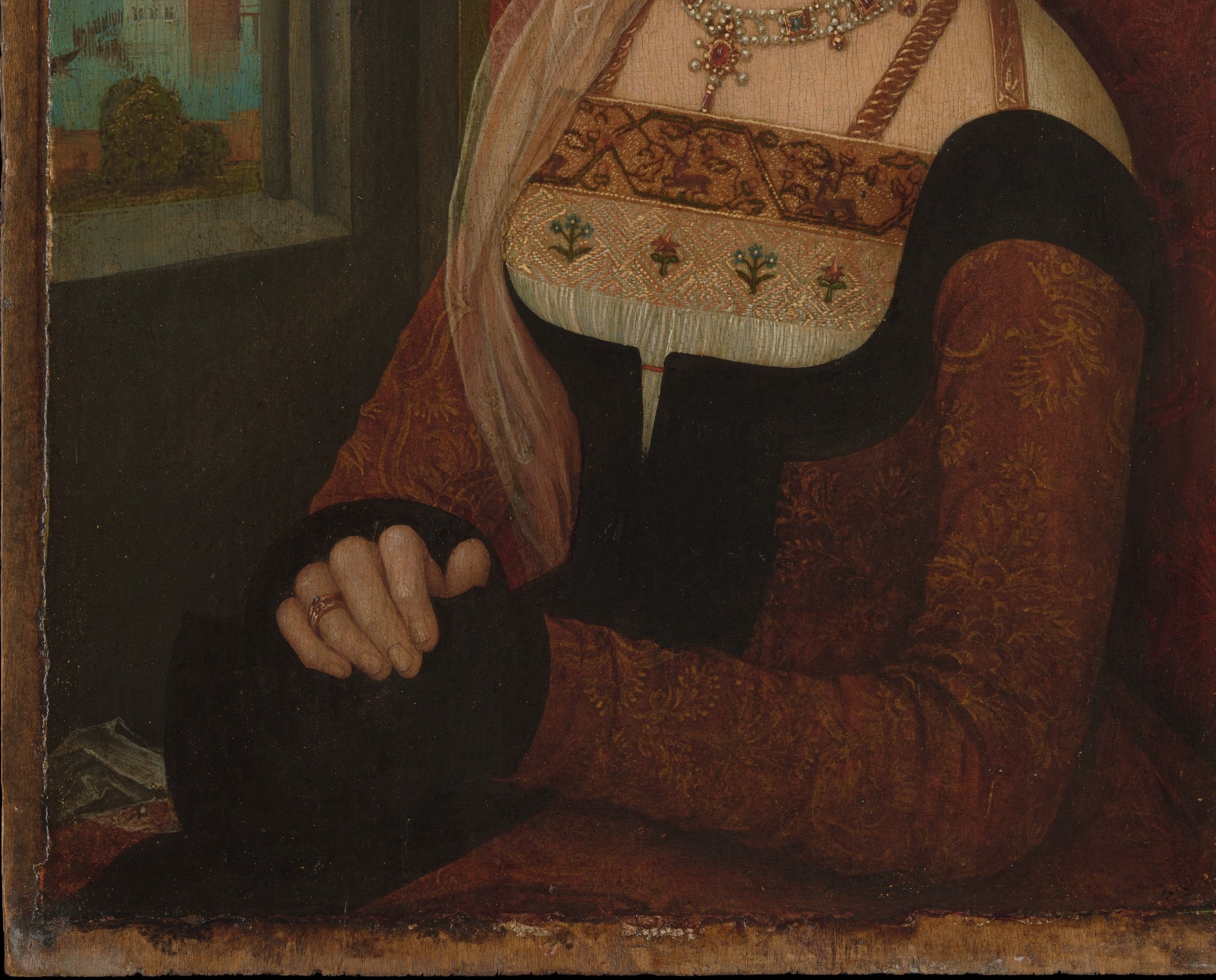 The saturated red grounds the palette and projects authority; its smooth paint application contrasts with the ornate upper zones, balancing opulence with solemnity.