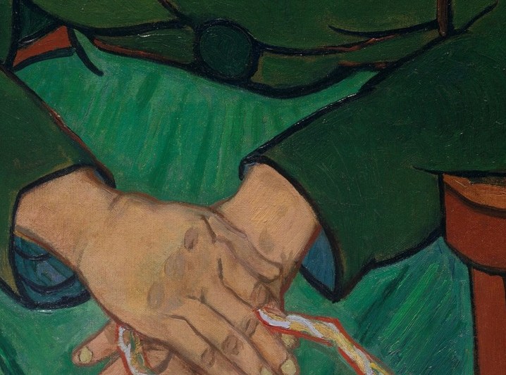Look closely at her hands, clasped around a rope.