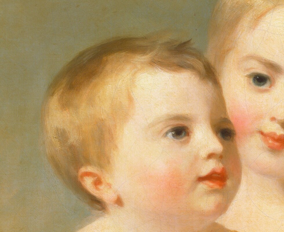 Captures a youthful innocence and curiosity, with bright eyes looking slightly off-camera.