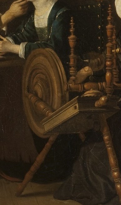 The intricate details of the wheel highlight the domestic labor and craft central to the scene.