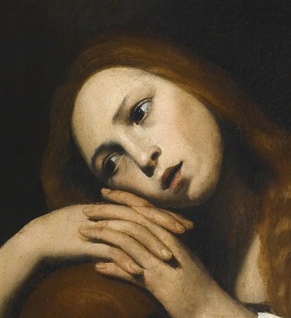Her downcast gaze and slightly parted lips convey a profound sense of sorrow and introspection.