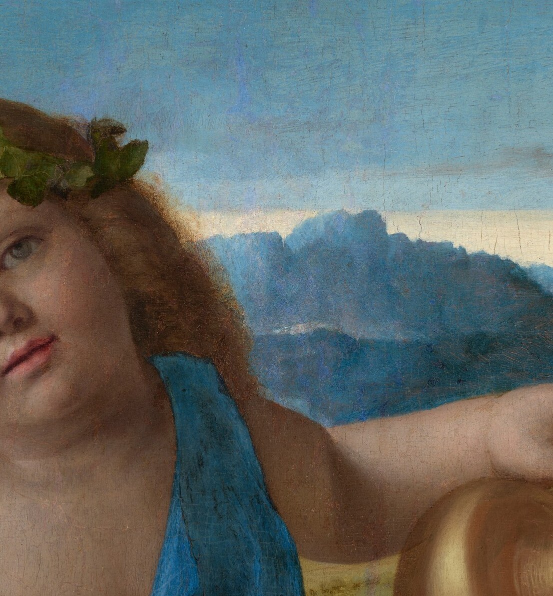 This young god dreams, lost in thought.