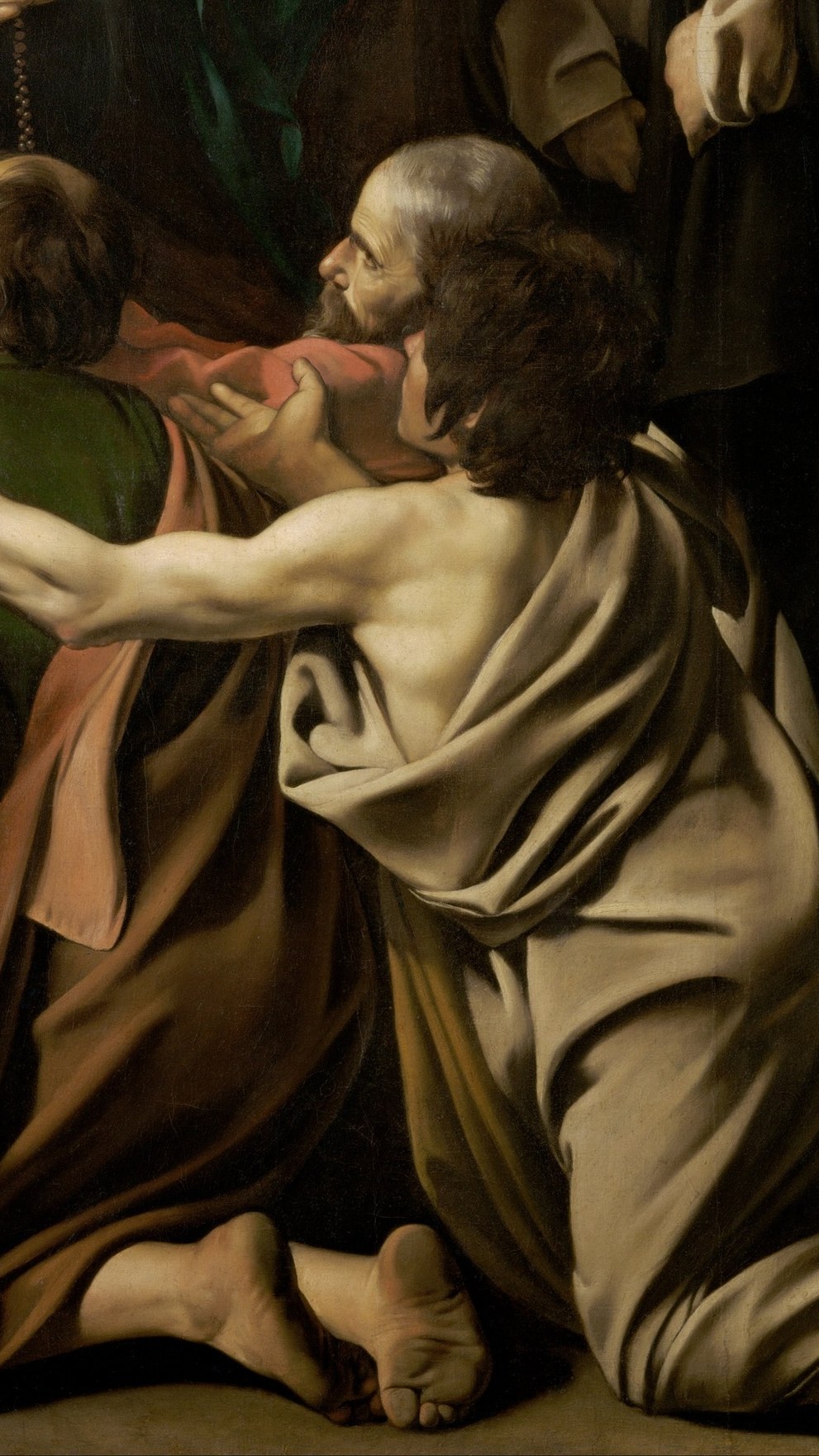 The dramatic foreshortening and musculature of this figure showcase Caravaggio's mastery of form.