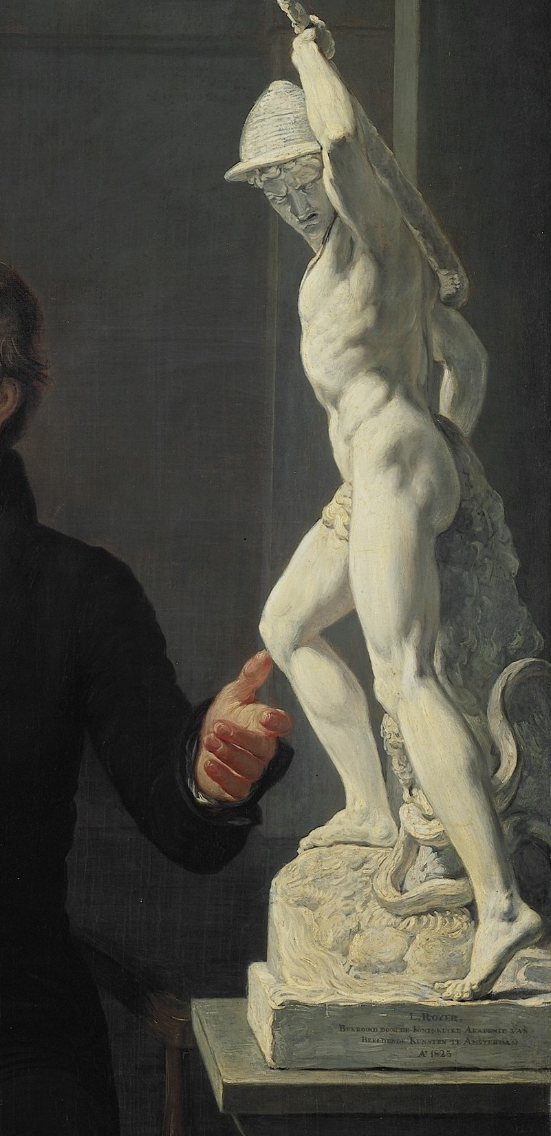 The sculptor, Louis Royer, proudly presents his work.